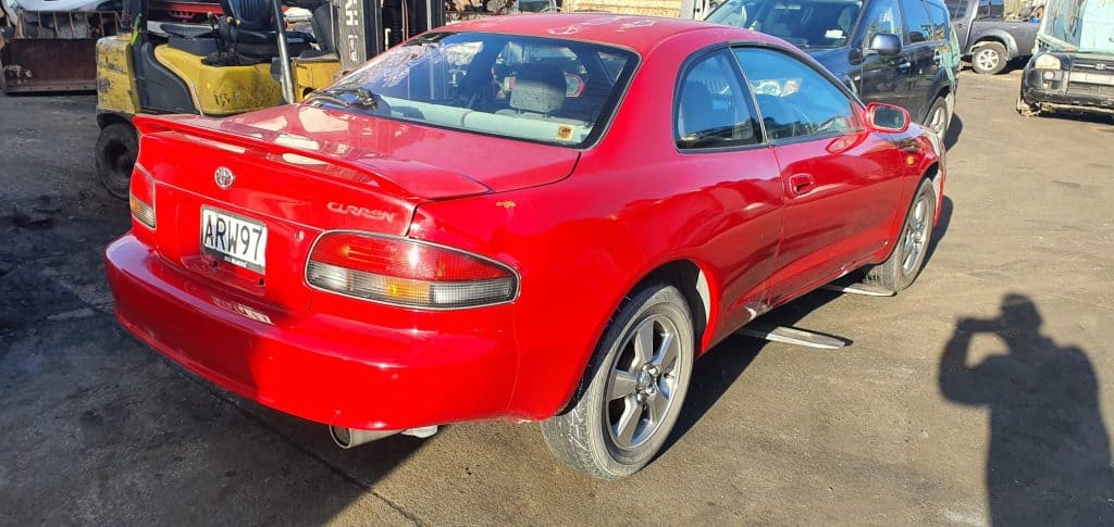 red junk car removed from manukau